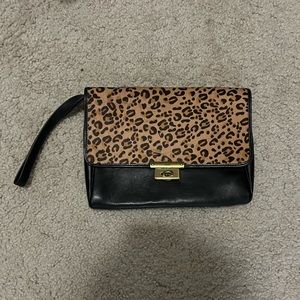 Fossil Cheetah and Black Clutch